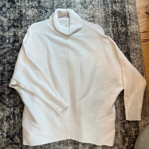White turtleneck sweater